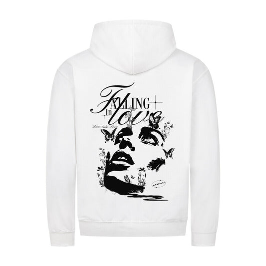 Kanimal "Falling in Love" Zipper Hoodie Unisex, Baumwollmischung – Dieser Hoodie in weiß zeigt einen künstlerischen Druck eines Gesichtes und Schmetterlingen, zusammen mit dem Schriftzug "Falling in Love". Er kombiniert stilvolle Romantik mit modernem Design. Hergestellt aus 80% Baumwolle und 20% Polyester, bietet der Kapuzenpullover mit Reißverschluss eine normale Passform und eine Kapuze mit Bändeln. Mit einem Gewicht von 280 GSM ist er ideal für Komfort und Stil.